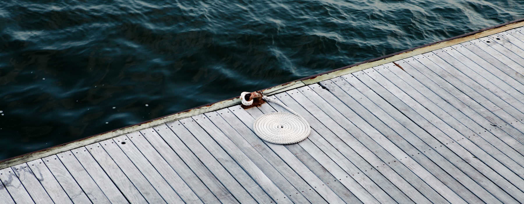 dock with coiled rope